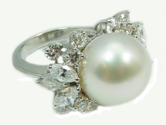 Exquisite Cartier platinum ring featuring a large South Seas pearl, size 6 1/2. Estimate: $20,000-$30,000. Elite Decorative Arts image.